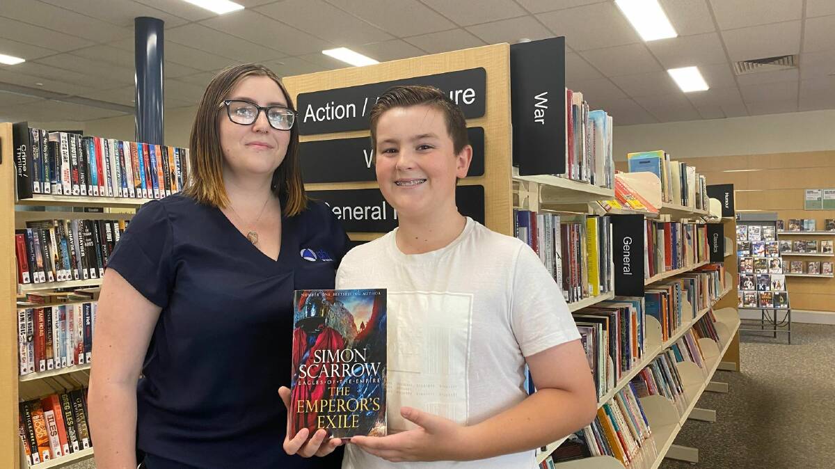 FICTION AND FANTASY: President of Griffith FAW Emily Fishenden alongside Henry Parsons who hopes to write his very own feature length novel by the end of the year. PHOTO: Lizzie Gracie
