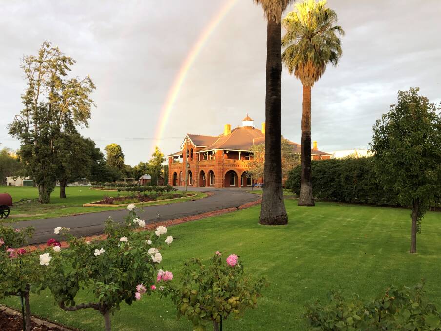 LEGACY OF EDUCATION: A rainbow rises over the original McCaughey homestead, once used for student accomodation, now housing school administration. PHOTO: Contributed