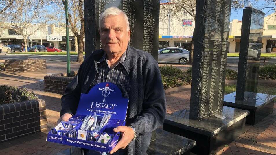 LEGACY AUSTRALIA HERE TO HELP: Griffith Legacy President Greg Walton selling badges last year amidst the pandemic. PHOTO: Declan Rurenga 