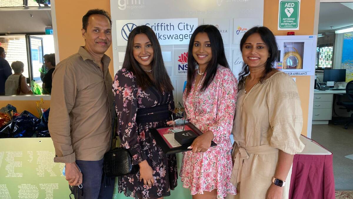 A FAMILY AFFAIR: Griffith Young Citizen of the Year Nayani Navaneethan alongside father Nava, mother Abi and sister Arini. PHOTO: Lizzie Gracie