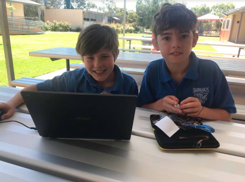 KEEN LEARNERS: Tharbogang students Benjamin Savage and Jaxon Ison loved taking part in the NSW VSA Program. PHOTO: Cheryle Glyde.