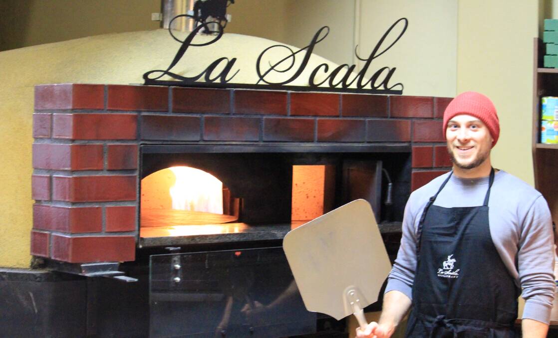 WHAT'S COOKING: La Scala pastry chef Alessandro Vico next to the restaurant's hybrid pizza oven which will be the centrepiece for 'Joy of Italian Cooking'. PHOTO: Vincent Dwyer