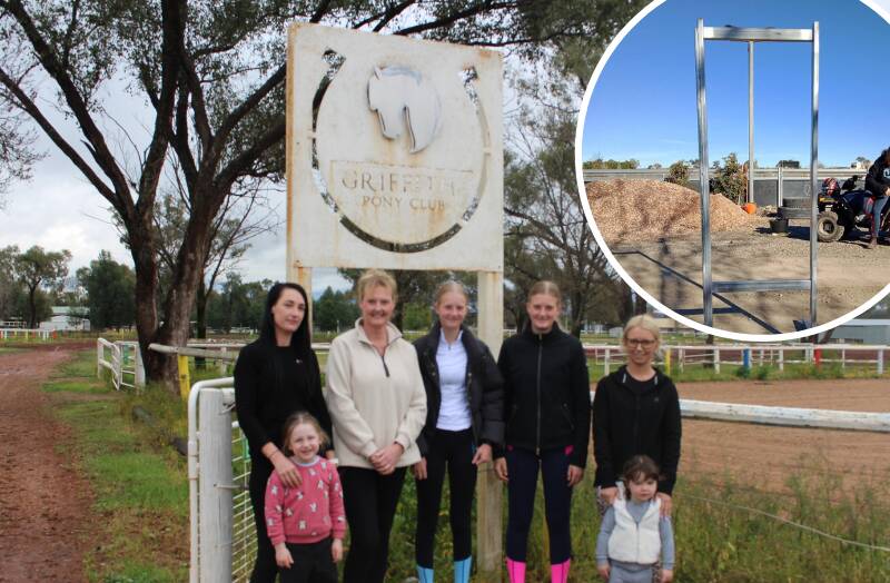 SEEKING INFO: Griffith Pony Club members Bailey Brown, Stephanie Brown, Jody Leembruggen, Ella Peters, Meia Peters, Angela Nancarrow and Aria Saunders, with an image of one of the stolen wings. PHOTO: Vincent Dwyer