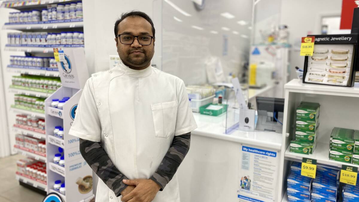 ROLL 'EM UP: Pharmacist Tejaskumar 'TJ' Patel said everyone should give themselves greater protection against the flu, with younger generations were being hit particularly hard this season. PHOTO: Vincent Dwyer