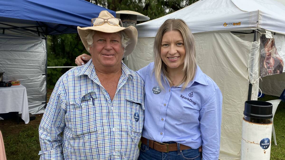 SPARKDROP: Creator of free rainfall measurement and comparison app, Sparkdrop, Sarah Armstrong with her dad Mick Armstrong. PHOTO: Vincent Dwyer
