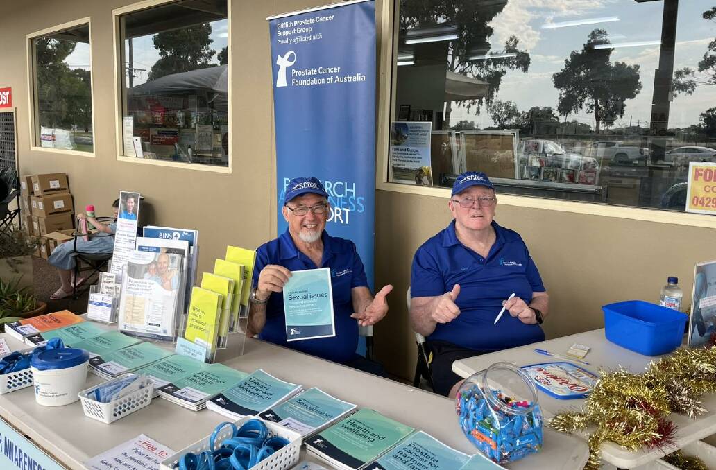 Griffith Prostate Cancer Support Group facilitator Colin Beaton and publicity officer Barry Maples manning the stall in Beelbangera on Saturday. Picture supplied