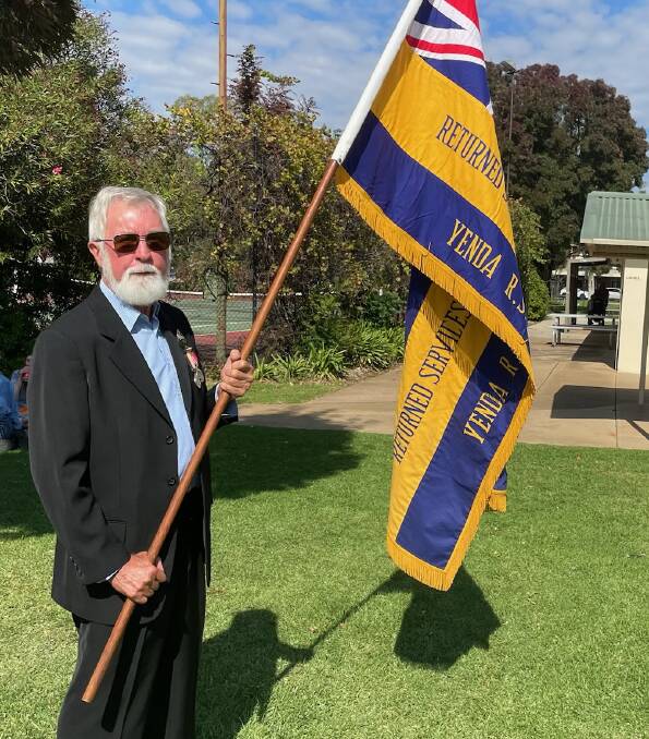 Yenda ex-serviceman, Neville Brown, proudly displayed the Yenda RSL sub-branch flag in this years march. Picture by Allan Wilson