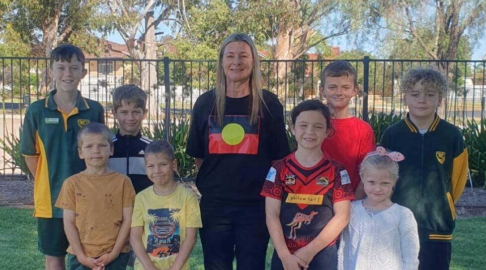 Yoogali Public School relieving principal Leanne Wade pictured with students on the Friday. Picture supplied. 