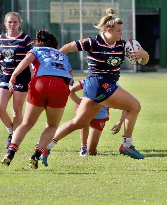 Ellie Johnston powers through tackles playing for Wauchope in last season's Lower North Coast women's 10s competition.