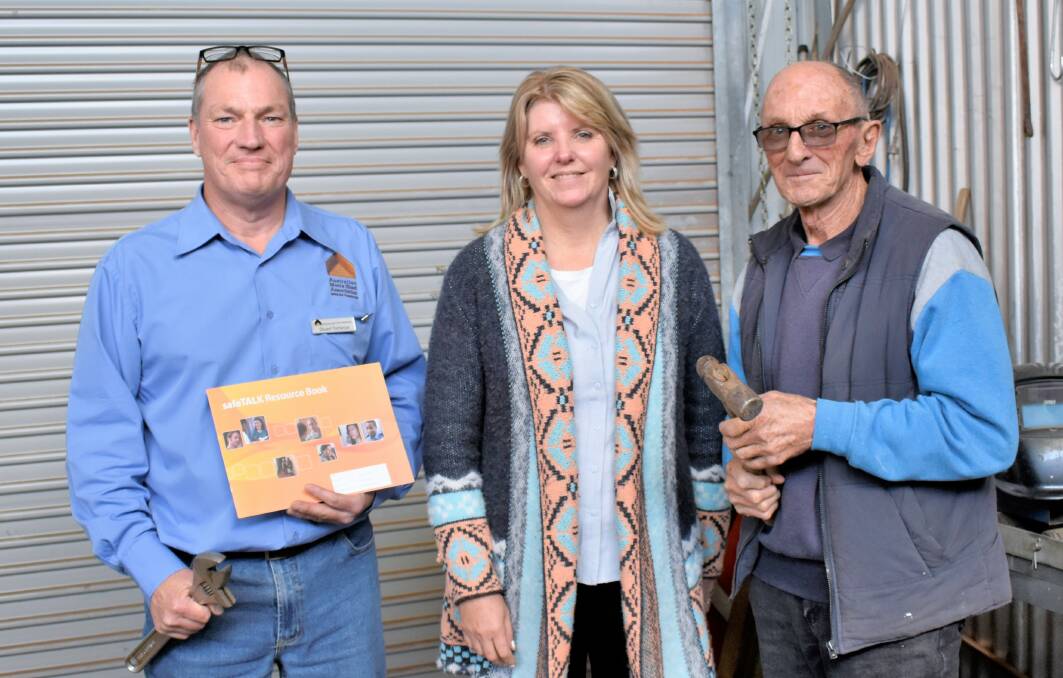 GATHERING: Men's Shed men's health project officer Stuart Torrance, Griffith Shed for Men coordinator Sue Pearce, and Griffith president Angelo Maloni discuss strategies for suicide prevention. PHOTO: Kenji Sato