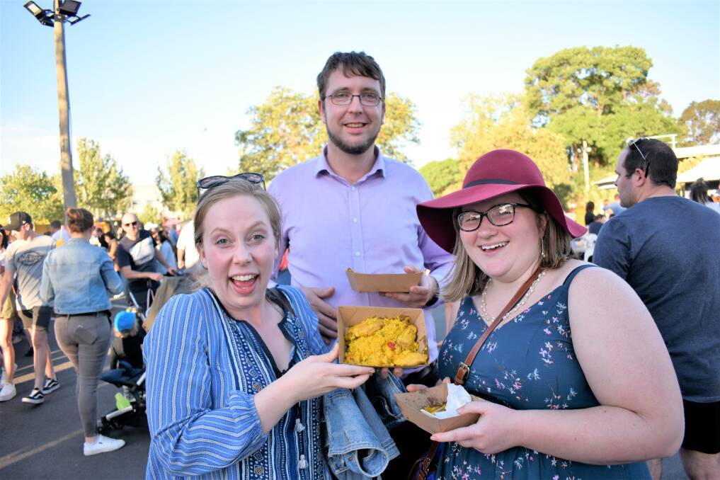 TRES AMIGOS: Charlotte Finlayson, Mitchell Reardon, and Rebecca Harvie get passionate about plates of paella at the LINX Launch Party. PHOTO: Kenji Sato
