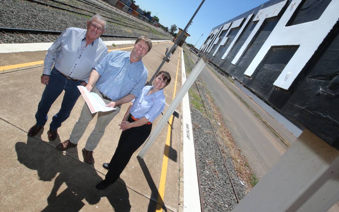 ON TRACK: Mayor John Dal Broi, Austin Evans and NSW Trainlink's Rita Montalto are looking forward to more trains arriving. Picture: Anthony Stipo