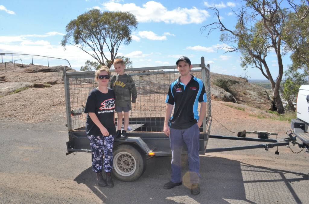FAMILY TEAM: Mum Sarah Brown, son Cody Brown, and dad Rob Brown were sick and tired of all the rubbish being left on Scenic Hill, so they decided to take matters into their own hands. Picture: Kenji Sato
