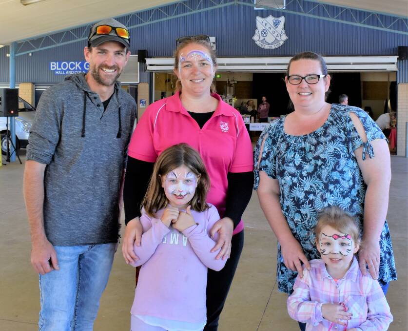 INAUGURAL FETE: Christian Callinan, school principal Bel Wallace, organiser Bethany Power, Zara Wallace, and Chantelle Power having a great time at Yenda Public School's first ever Fete and Car Show on May 5. PHOTO: Kenji Sato