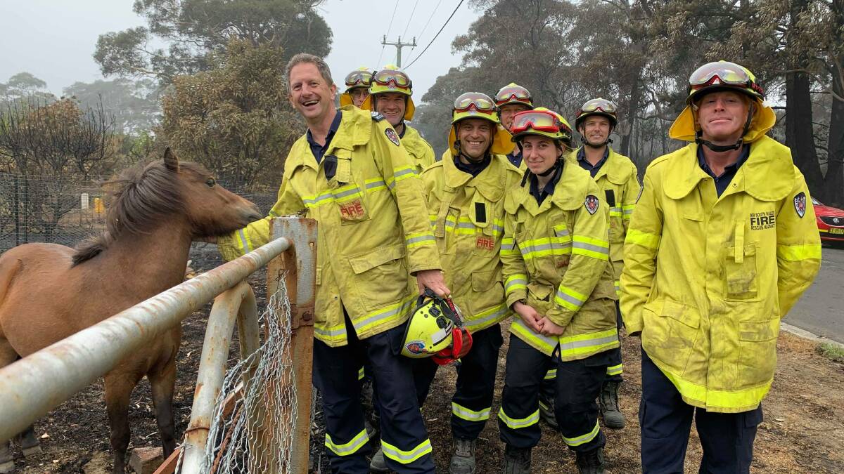 Local firefighters and a horse rescued from the Lithgow bushfires. Photo: Contributed