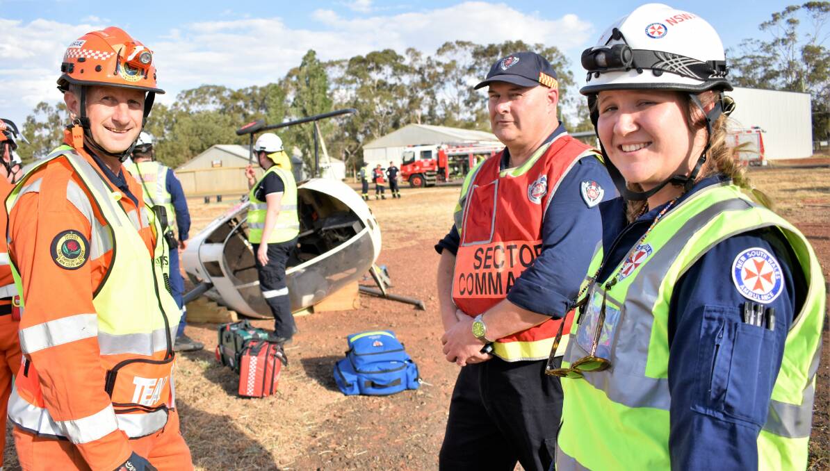 JOINING FORCES: SES team leader Anthony Hatch, Fire and Rescue NSW sector commander Doug Cattanach, and level two paramedic Jilli Kerr. PHOTO: Kenji Sato
