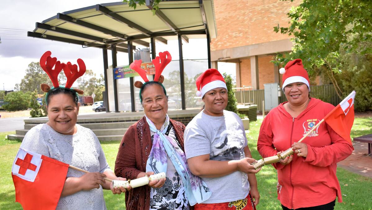 SETTING THE TONE: Ofa Tuiaki, Litia Kosi, Ofa Ulupano, and Siulia Lokeni from the Tongan Community Choir will be singing a mix of traditional Tongan and English Christmas carols at Memorial Park on December 8. PHOTO: Kenji Sato