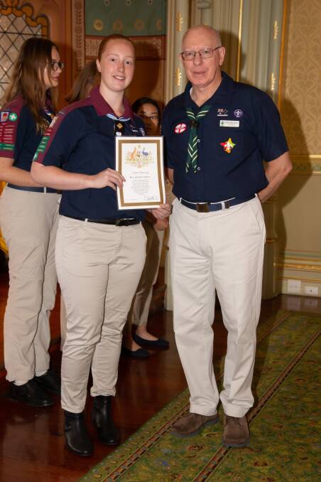 SCOUT'S HONOUR: Claire Murray meets with David Hurley, former Governor of NSW. On the day there were 40 Venturer Scouts who gathered at Government House in Sydney to receive a Queen's Scout badge. PHOTO: Contributed
