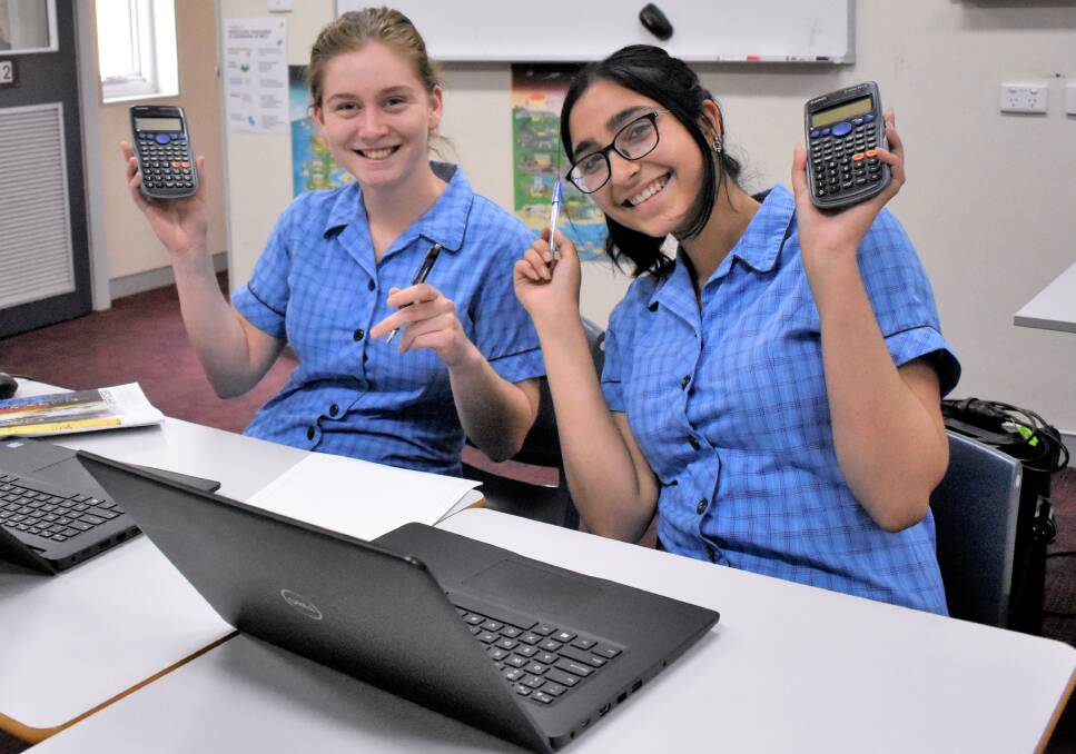 NEW FRONTIER: Ruby Bennett and Tarnpreet Kaur did the Science Extension exam and lived to tell the tale. It's a brand new research-themed subject, and it had the first online exam in the history of the HSC. PHOTO: Kenji Sato