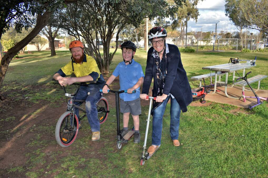 ROLLIN: David Dunn, Jackson Dunn, and Ann Furner are rallying the Yenda community to vote for a skate park in the town's centre. PHOTO: Kenji Sato