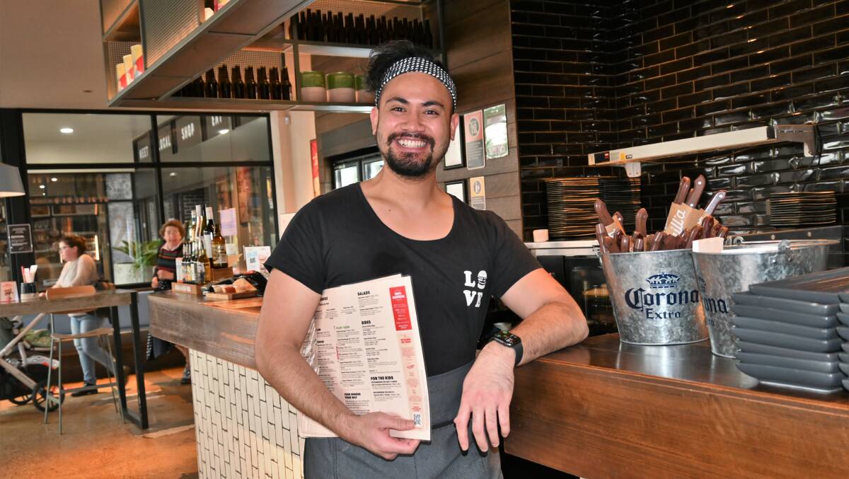 BUSY BEE: Grill'd assistant manager Atipela Junior Tuvale is busier than ever. Picture: Kenji Sato