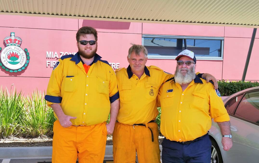 SON, DAD, GRANDDAD: Ronald Harris, Lawrence Harris, and Ron Harris joined forces to beat back the fires threatening Tumut. PHOTO: Contributed