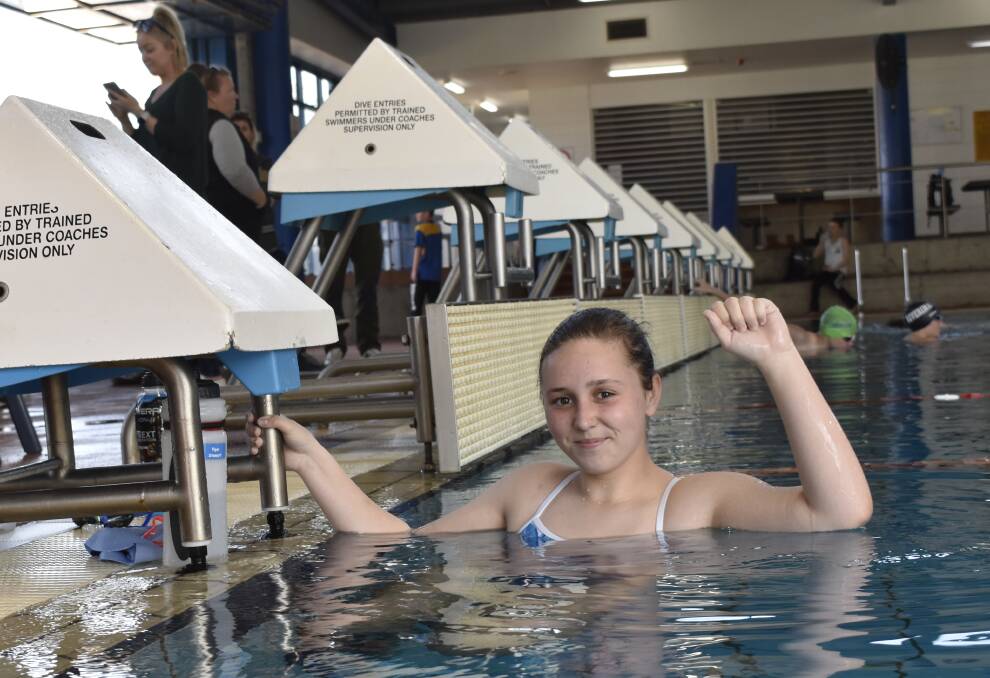 IN HER ELEMENT: 13-year-old Piper Stewart founded the Bambigi charity to pay for other Aboriginal kids' swimming lessons. Over the course of 18 months she's helped over 80 kids learn how to swim. PHOTO: Kenji Sato