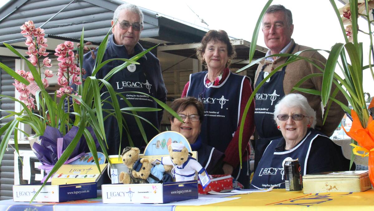 SUPPORTING WAR WIDOWS: Graham Young, Anne Veenhuizen, Wayne McLauchlan, Val Giddey and Beverley Young encourage residents to pop down to the Kiosk. Picture: Monique Patterson