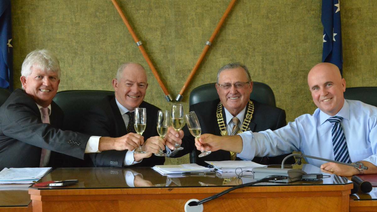 CHEERS: Griffith City Council general manager Brett Stonestreet, St Vincent's Private Hospital Sydney chief executive officer Robert Cusack, Griffith mayor John Dal Broi and Member for Murrumbidgee Adrian Piccoli make a toast after signing the private hospital lease.