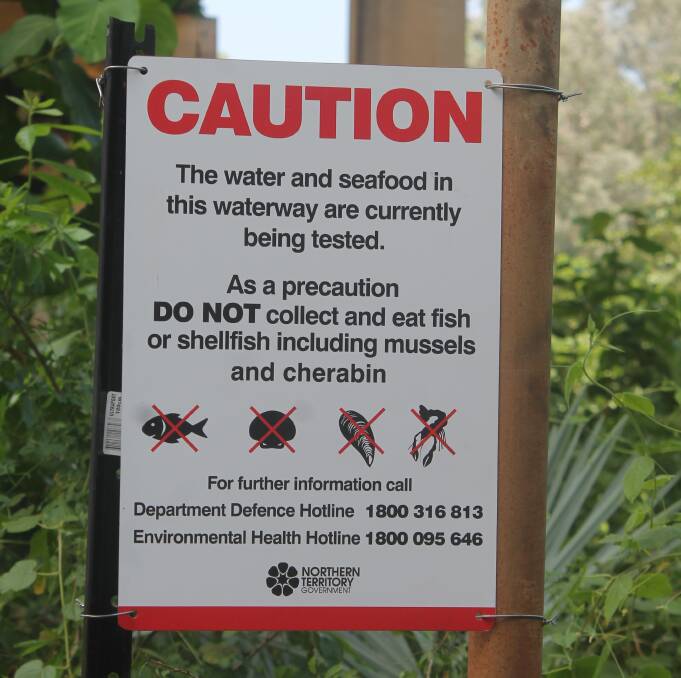 Signs on the Katherine River.