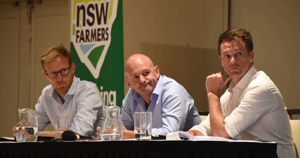 NSW Regional Water Minister Niall Blair (centre) says the Office of Environment and Heritage is a policy setter and directly benefits from those policies as a water seller, something he says is fundamentally wrong. 