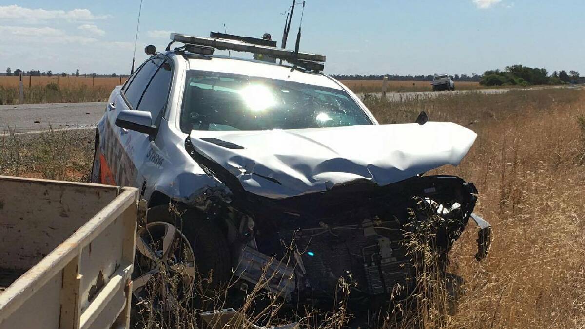 LUCKY ESCAPE: The highway patrol car following the accident. PHOTO: Supplied.