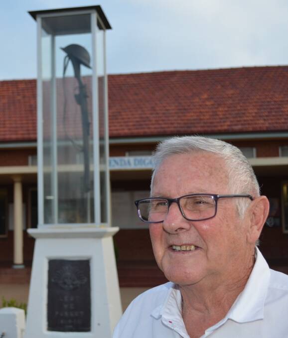 LEST WE FORGET: Yenda RSL President Alan Wakely stands in front of the rifle monument to WWI soldiers. Picture: Hannah Higgins.