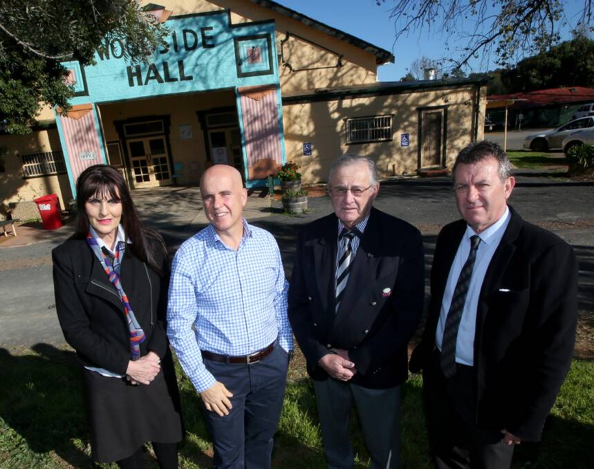 TIME FOR AN UPGRADE: Christine Stead, Adrian Piccoli, John Dal Broi and Max Turner outside the Woodside Hall. Picture: Anthony Stipo.