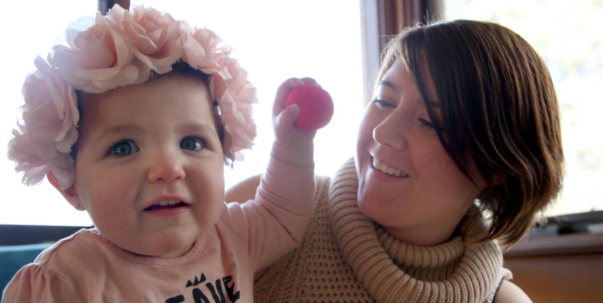 RED NOSE DAY: This Red Nose Day Natasha Firebrace with her daughter Emelia, 18 months, will be raising money in memory of her sister twin Sheridan who passed away from SIDS. Picture: Anthony Stipo.