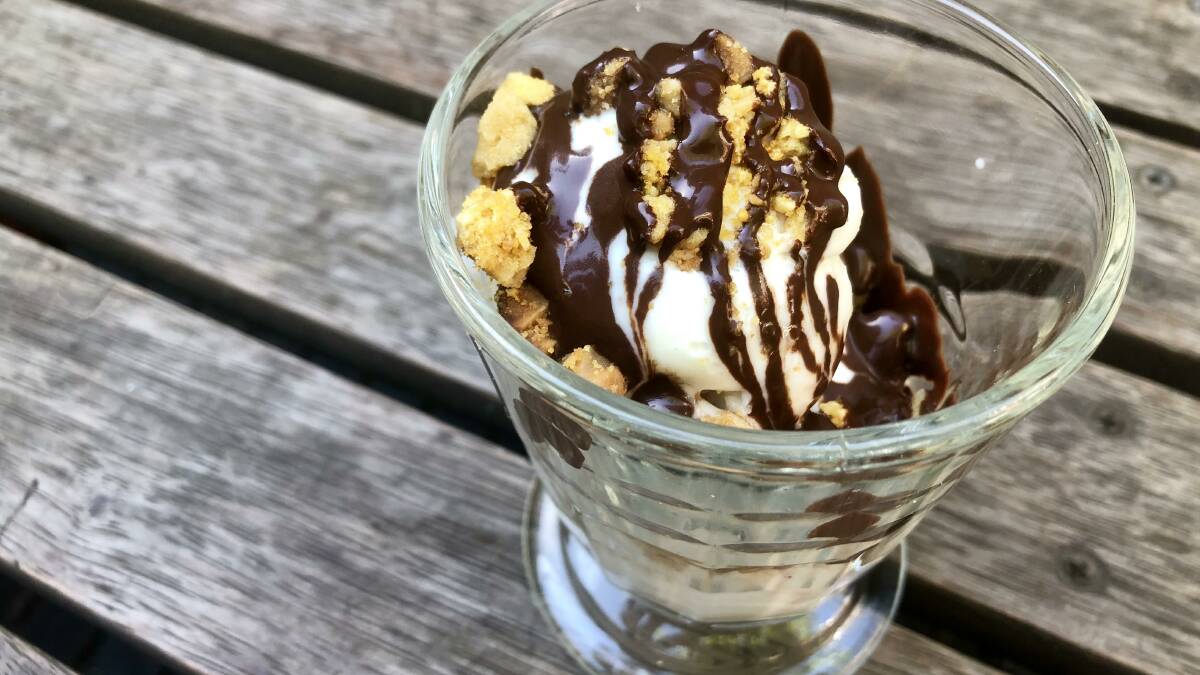 Kids' vanilla ice-cream sundae with honeycomb sprinkles and chocolate sauce from the Builders Arms Hotel's Bistro. Picture: Supplied
