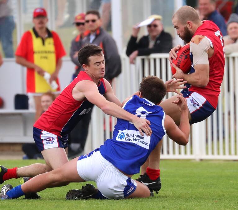 Shaun Campbell and Jimmy Kennedy in action for Riverina League against Farrer last year. 