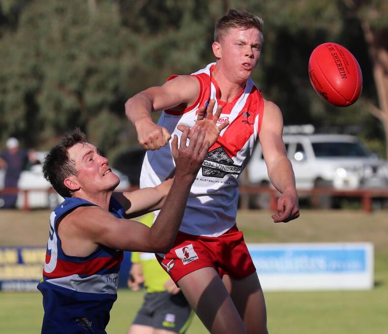 WHACK: Griffith ruckman Riley Irvin spoils Turvey Park's Josh Campbell in the Riverina League game at Maher Oval on Saturday. Picture: Les Smith