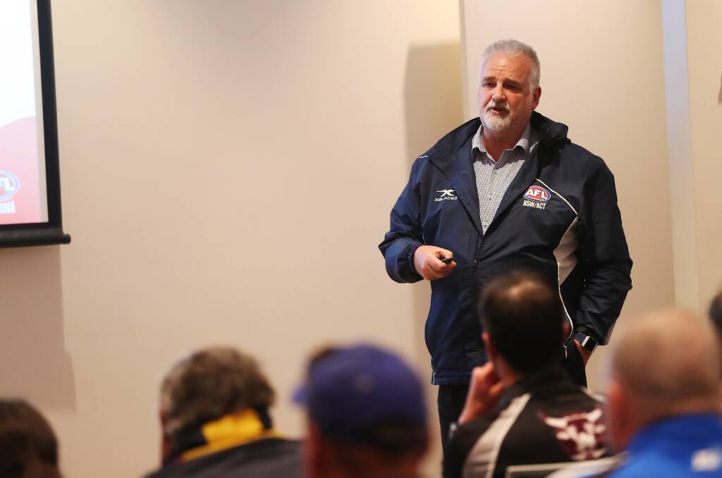 MAIN MAN: Independent consultant David Burgess delivers his AFL Riverina Competitions Review to clubs at The Rules Club in Wagga on Sunday.