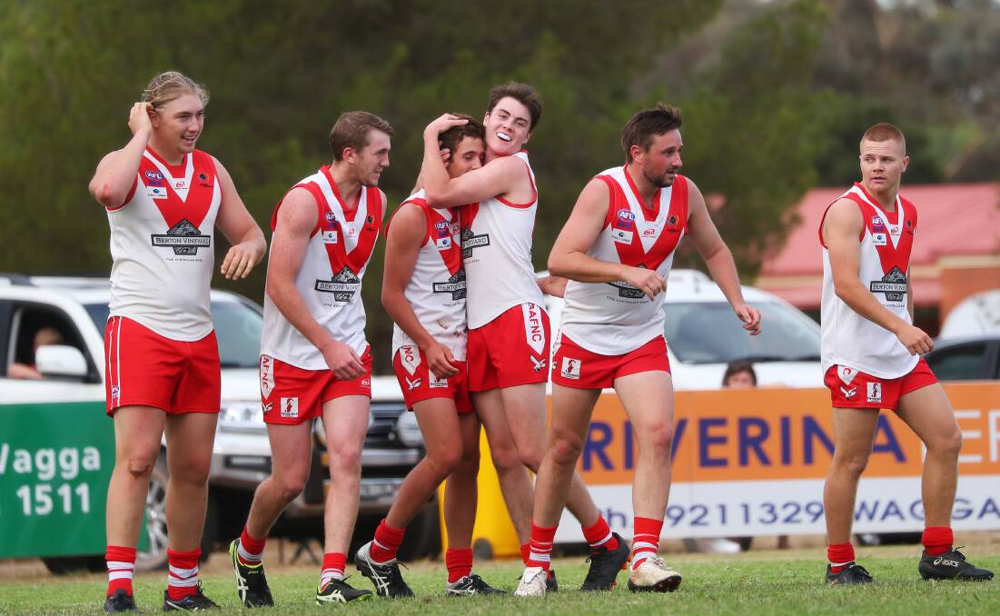 Griffith players celebrate a goal during the round one win over Collingullie-Glenfield Park at Crossroads Oval. Picture: Emma Hillier