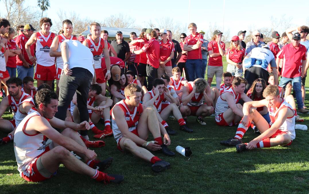 DEVASTATION: Griffith players come to terms with the grand final loss at the presentation on Saturday. Picture: Les Smith