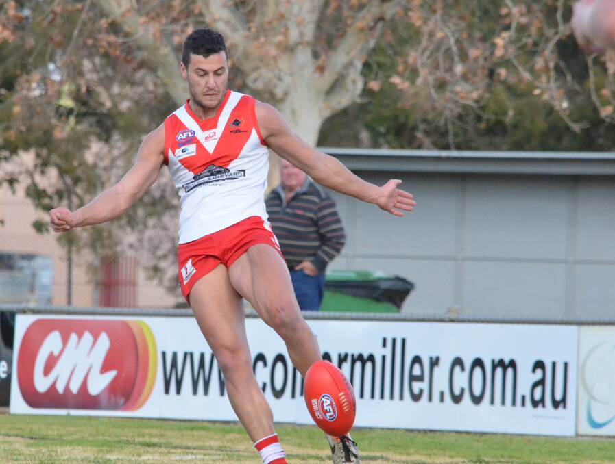 ON SONG: Griffith's Jordan Iudica kicks the ball up the field in the Riverina League clash against Coolamon at Exies Oval on Saturday. Picture: Liam Warren