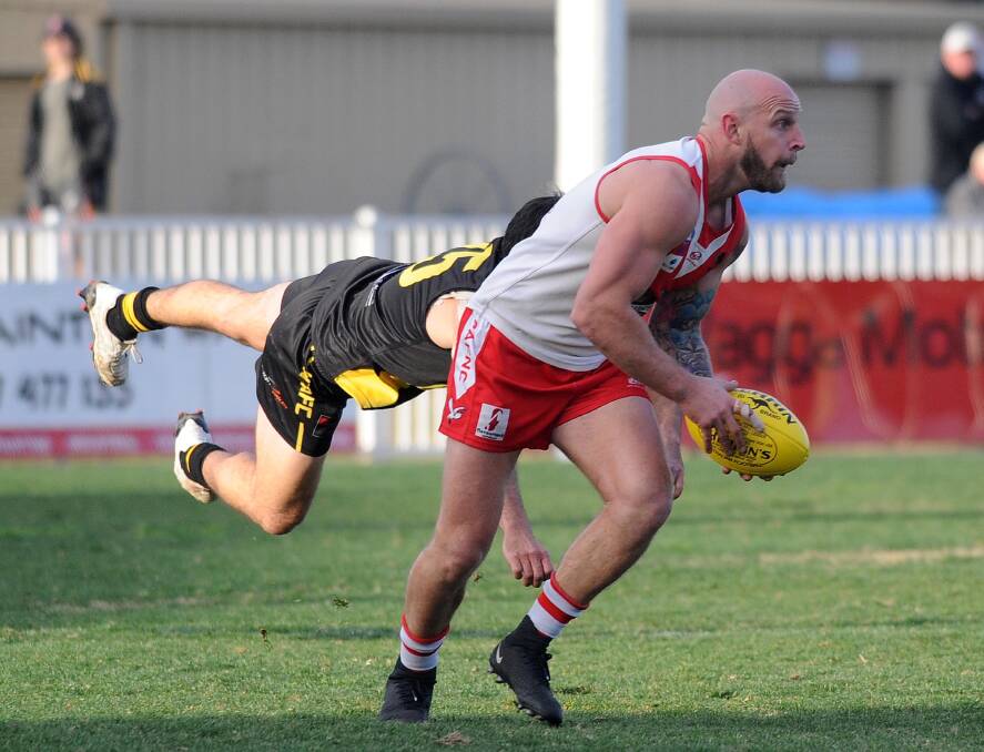 Riverina League coach Guy Orton in action for Griffith.
