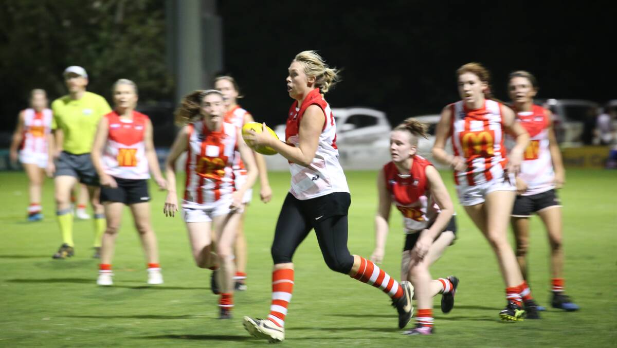 ON AGAIN: Swans' Jess Hill in action during the final of this year's competition at Exies Oval. 