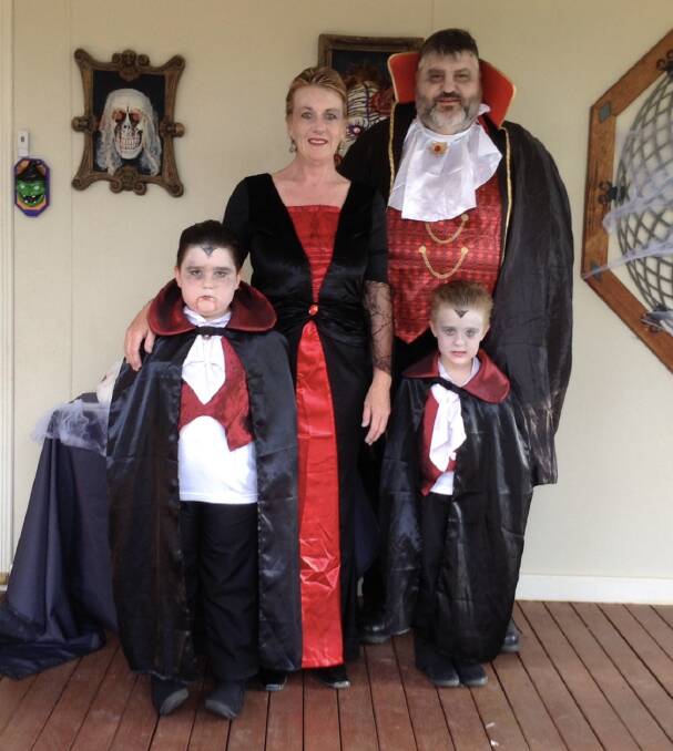 TRICK OR TREAT: Rayna Geaney and partner Mark Baltieri with their children Matthew (left) and Daniel. PHOTO: Sourced