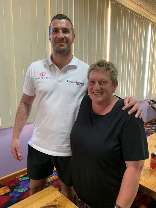 SHARING STRUGGLES: Joel Thompson from the Manly Sea Eagles and Marie Clarke in Goolgowi last Friday. Mr Thompson shared his mental health journey with residents as part of his Mindset Project. 