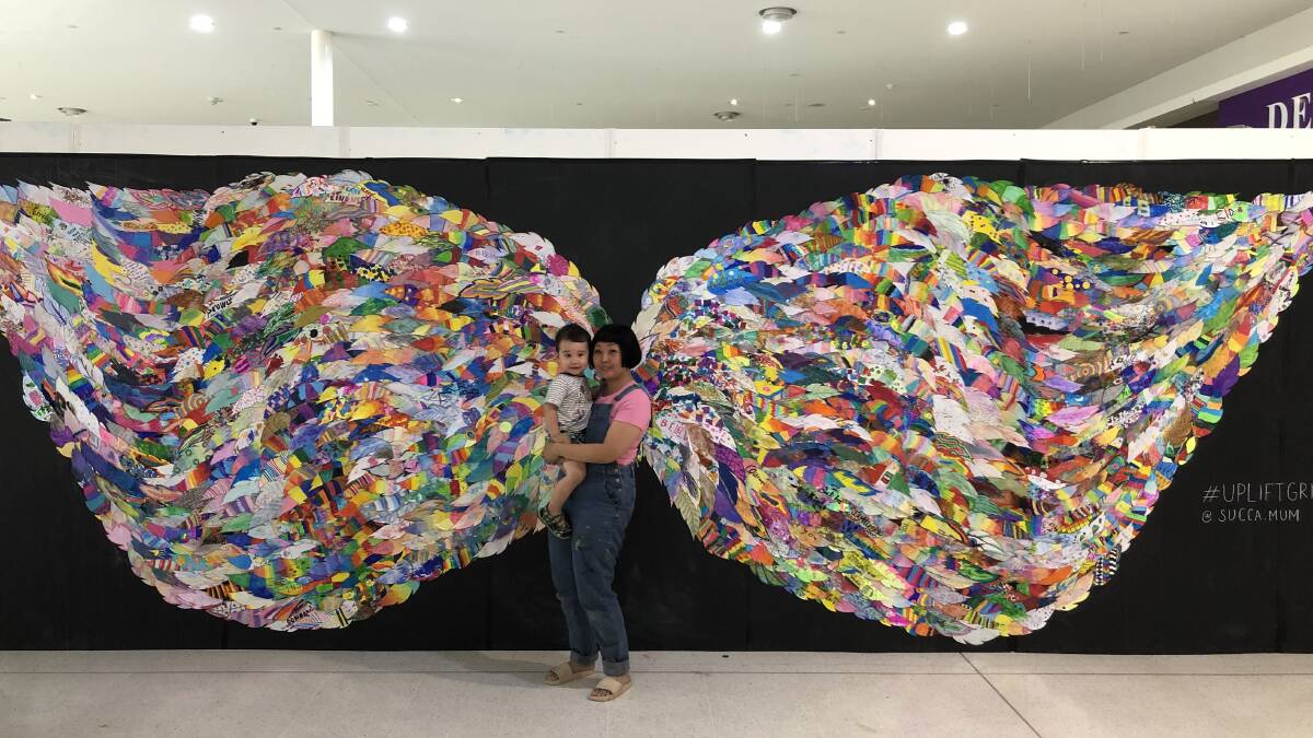 CONTRIBUTION: Six metres of feathers from over 1000 submissions have contributed to Uplift Griffith. PHOTO: Kat Vella