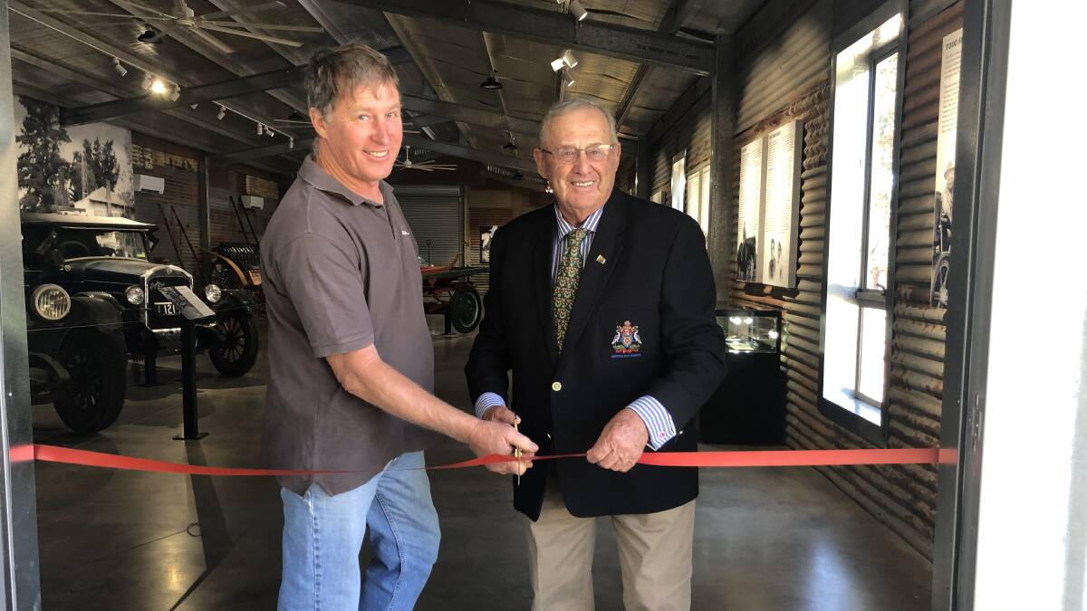 WELCOME: Rodney Guest and Griffith City Council Mayor John Dal Broi officially open the motor vehicle exhibit 'Todd Shed' at the Pioneer Park Museum. PHOTO: Kat Vella