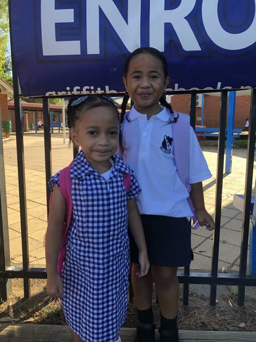 COUSINS: Hope Laufesiliai Tafili and her cousin Diamond Tomi started their first day of Kindergarten together at Griffith Public School. PHOTO: Kat Vella