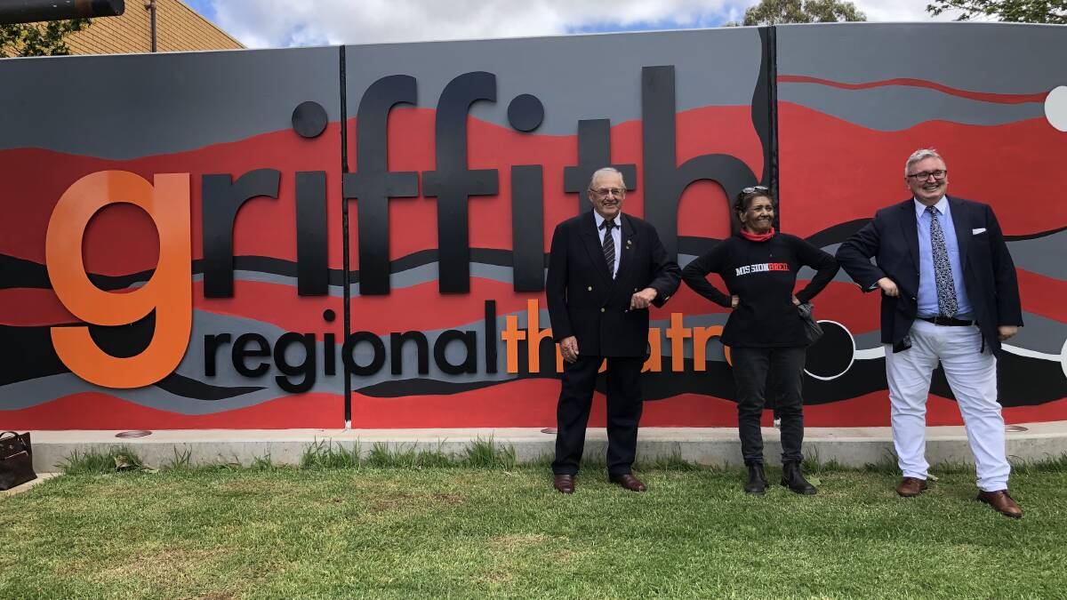 MURAL ART: Griffith City Council mayor John Dal Broi and NSW minister for arts Don Harwin with Wiradjuri artist Veronica Collins and her mural artwork. PHOTO: Kat Vella